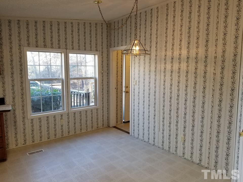 900 Milton Road Durham, NC 27712 - Photo 14 of 21 a view of an empty room with a window
