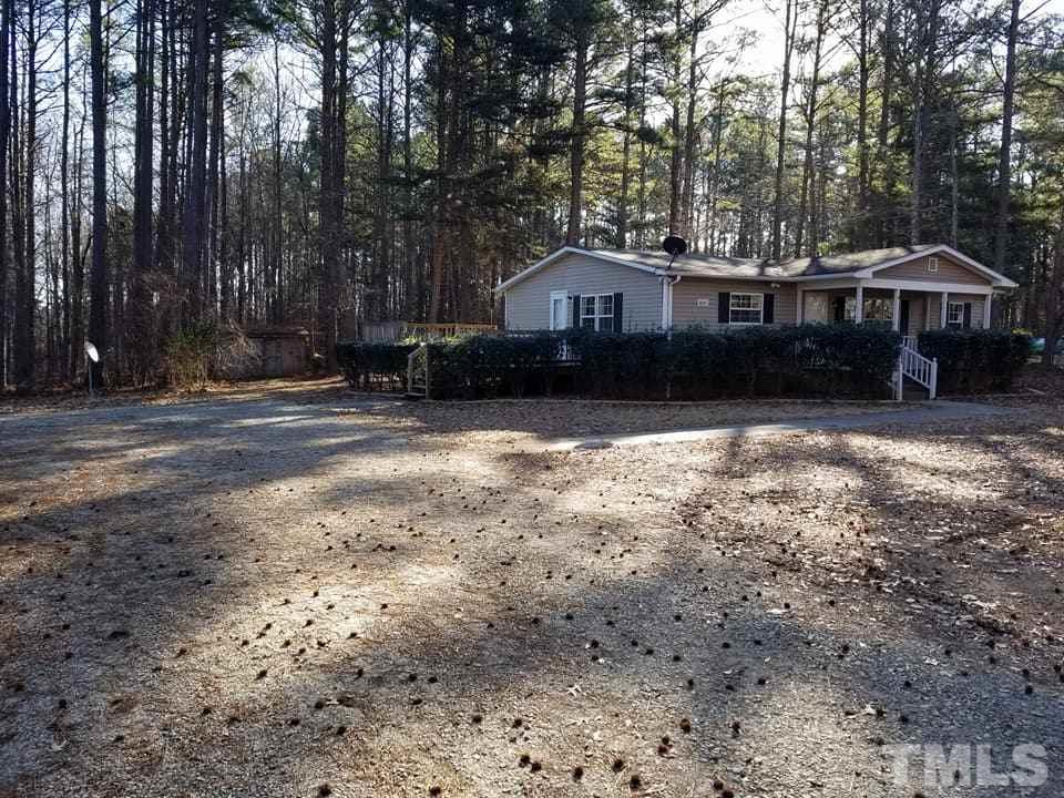 900 Milton Road Durham, NC 27712 - Photo 19 of 21 a front view of a house with yard and tree s