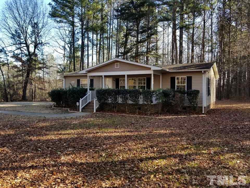 900 Milton Road Durham, NC 27712 - Photo 3 of 21 a front view of a house with garden