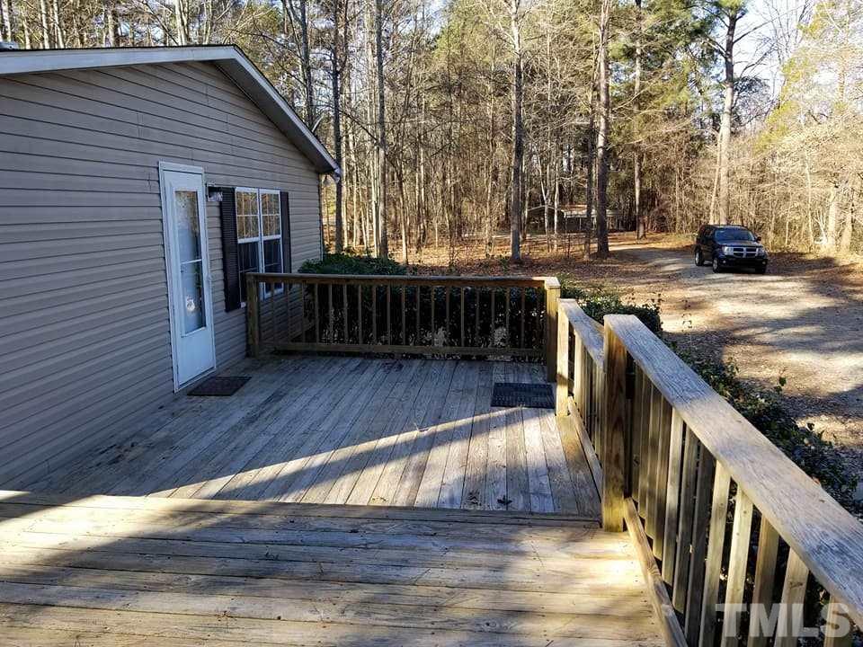 900 Milton Road Durham, NC 27712 - Photo 7 of 21 a view of outdoor space with wooden floor and staircase