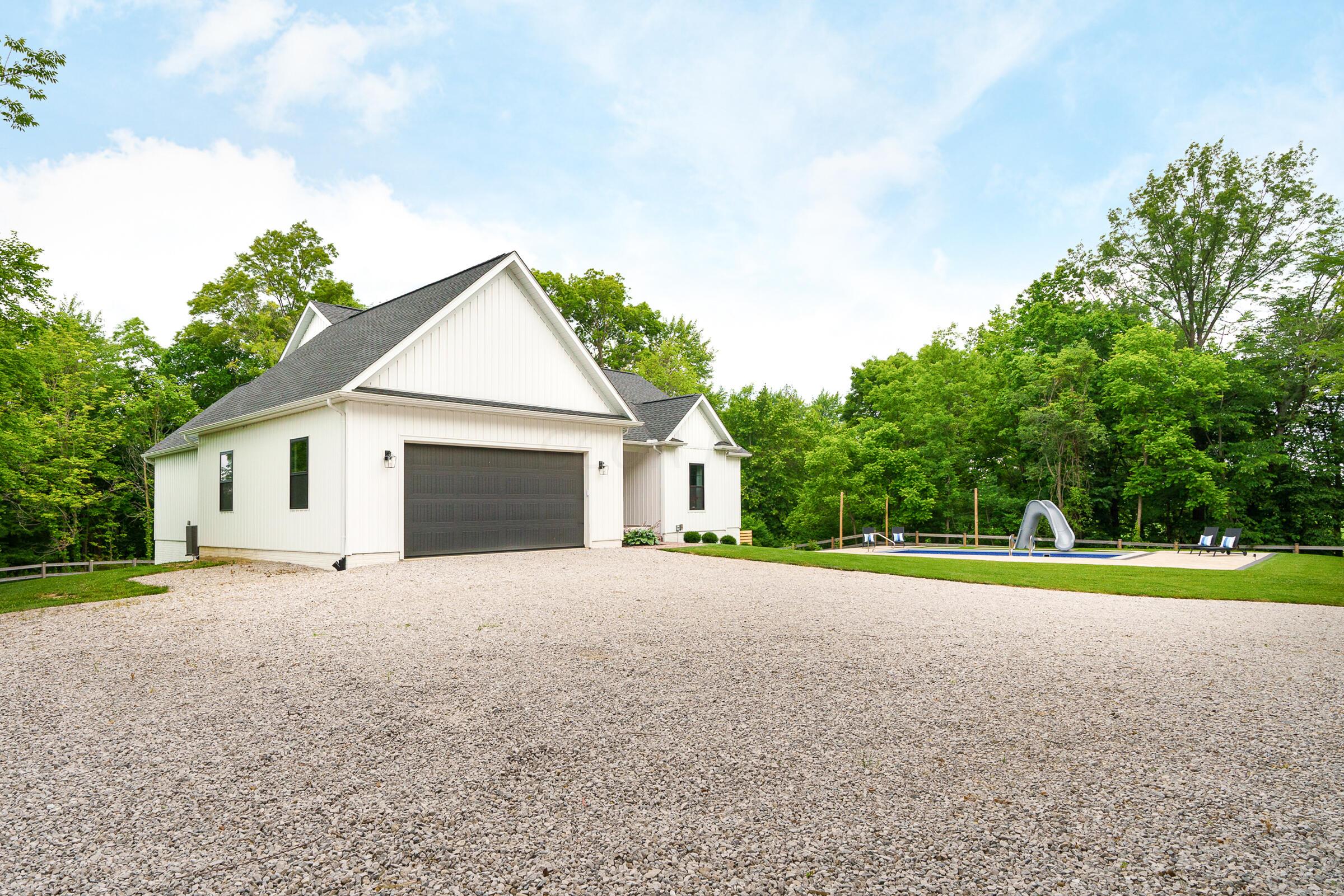 701 Ross Road Sunbury, OH 43074 - Photo 66 of 74 Enjoy an attached 2-car garage and plenty of parking for guests