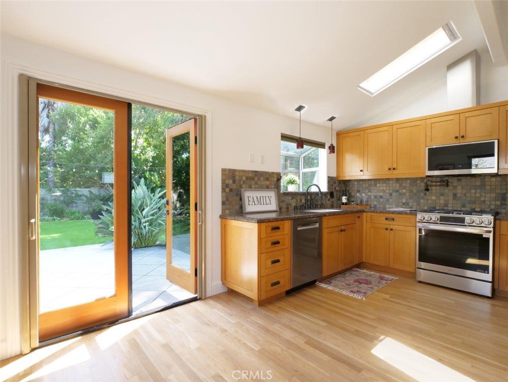 2804 Vail Avenue Redondo Beach, CA 90278 - Photo 11 of 29 a kitchen with granite countertop a stove a sink and a granite counter top