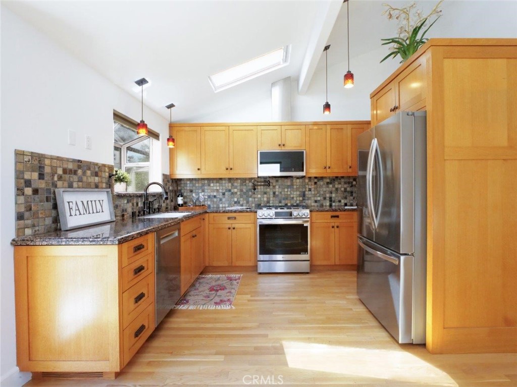 2804 Vail Avenue Redondo Beach, CA 90278 - Photo 12 of 29 a kitchen with stainless steel appliances granite countertop a refrigerator a stove and a sink