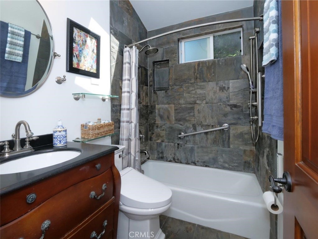 2804 Vail Avenue Redondo Beach, CA 90278 - Photo 17 of 29 a bathroom with a granite countertop sink mirror bathtub and toilet