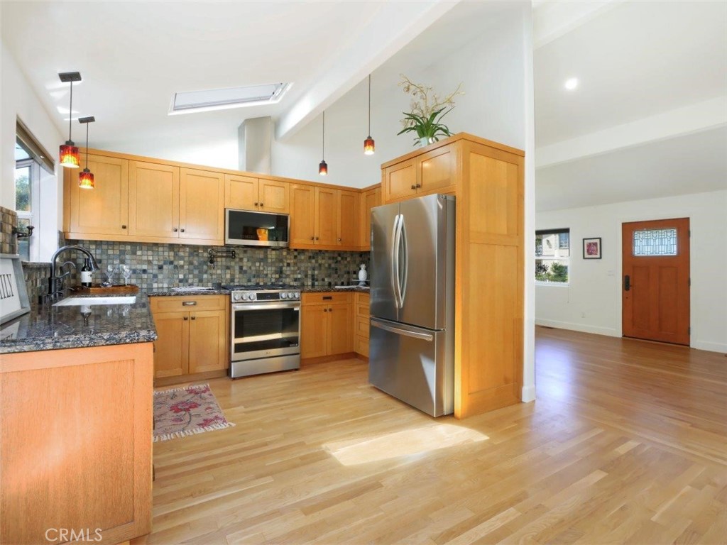 2804 Vail Avenue Redondo Beach, CA 90278 - Photo 10 of 29 a kitchen with stainless steel appliances a refrigerator and a stove top oven