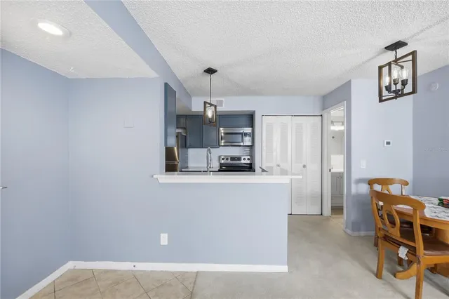 a bedroom with a bed and furniture