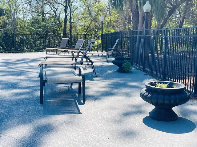 a view of pool with outdoor seating