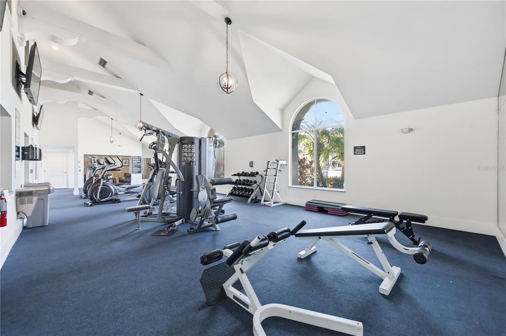 5108 Conroy Road, Unit 1724 Orlando, FL 32811 - Photo 26 of 40 a view of a room with gym equipment