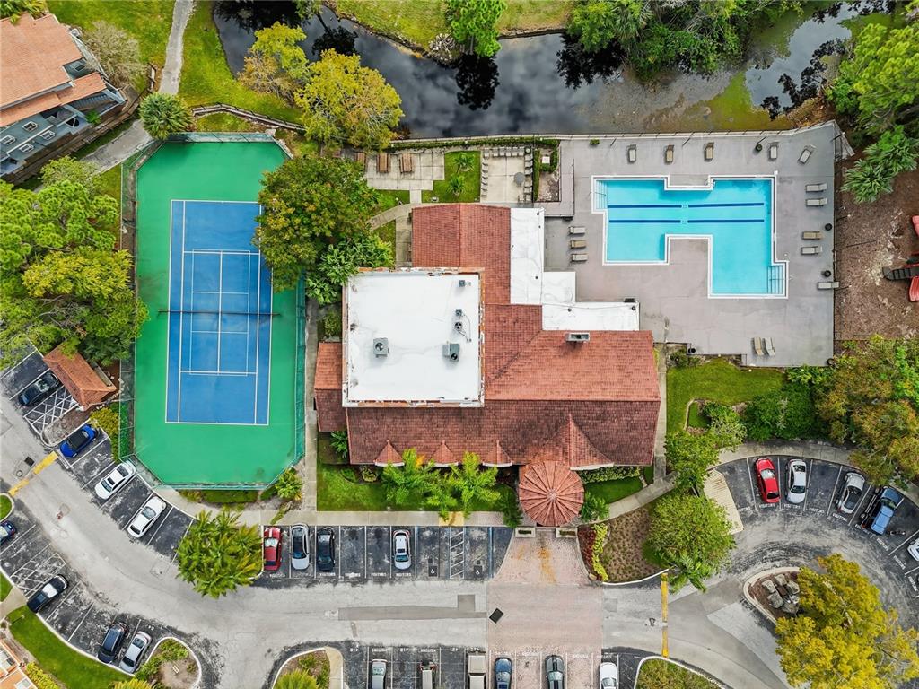 5108 Conroy Road, Unit 1724 Orlando, FL 32811 - Photo 30 of 40 an aerial view of a house with a garden and a yard