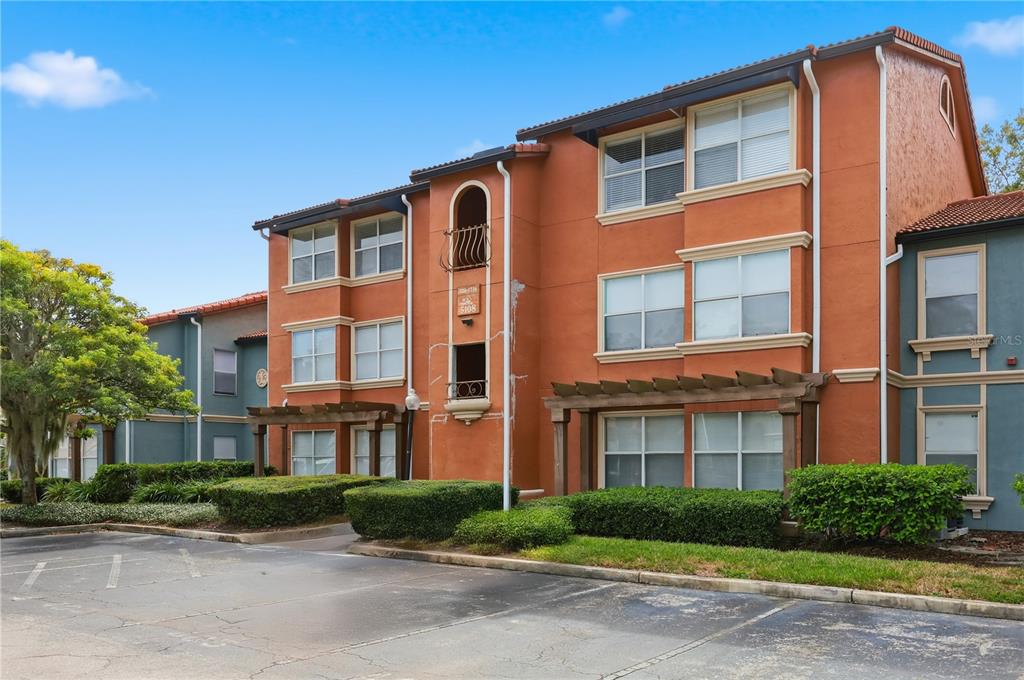 5108 Conroy Road, Unit 1724 Orlando, FL 32811 - Photo 3 of 40 a front view of a building