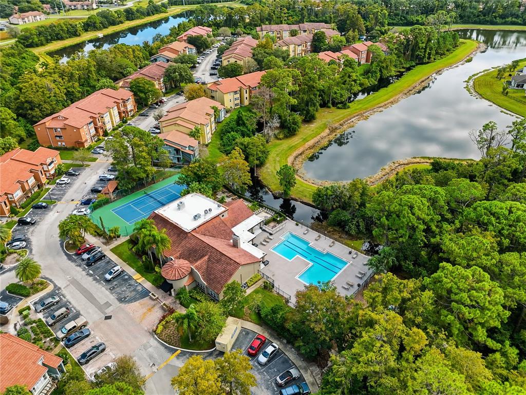 5108 Conroy Road, Unit 1724 Orlando, FL 32811 - Photo 33 of 40 an aerial view of a house with a lake view
