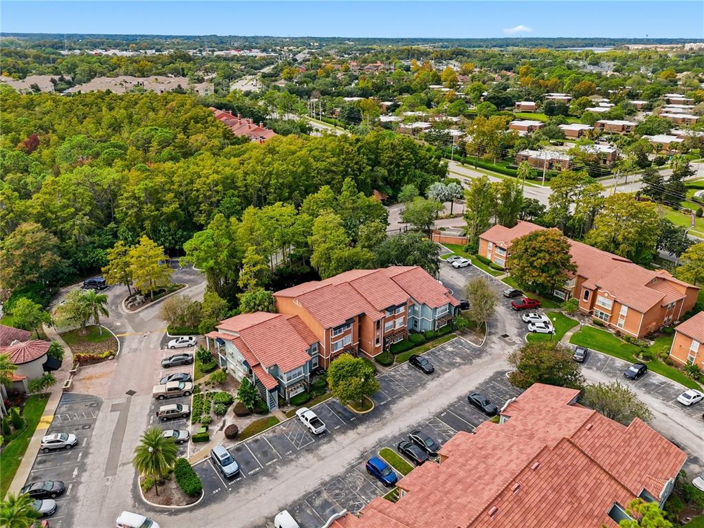 5108 Conroy Road, Unit 1724 Orlando, FL 32811 - Photo 40 of 40 an aerial view of residential houses with outdoor space