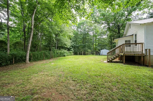 a house view with a garden space