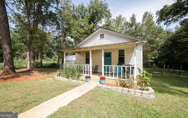 a view of backyard with green space