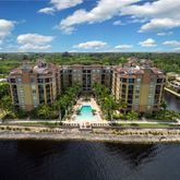 a view of a lake with a large yard