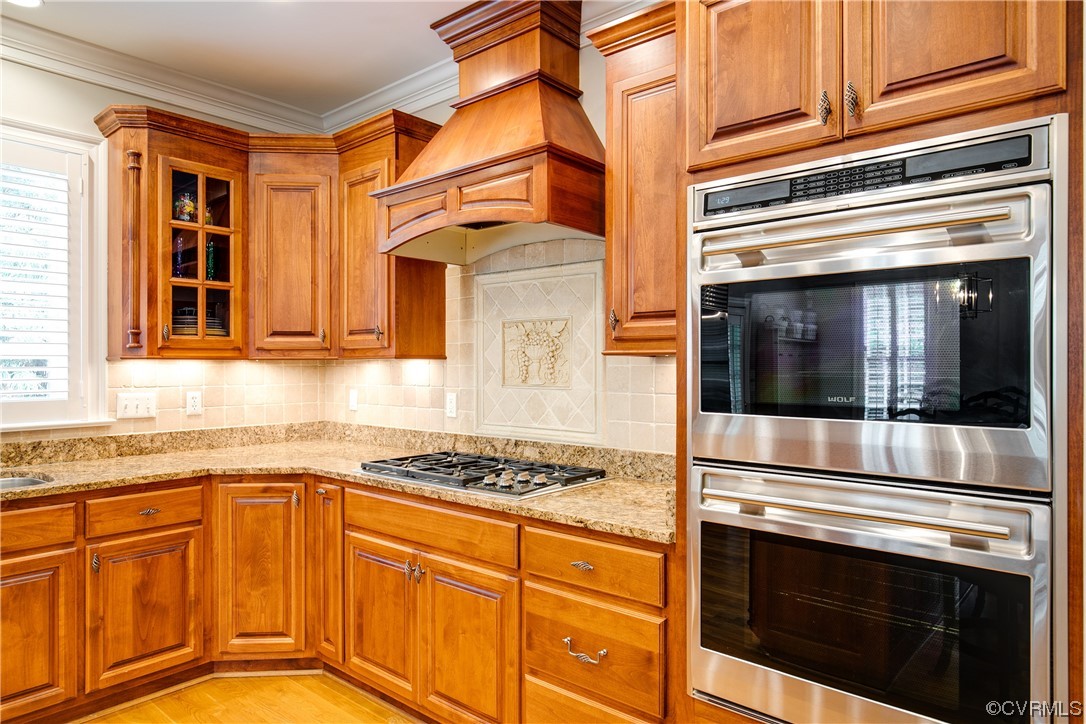 3631 Lansdowne Road Midlothian, VA 23113 - Photo 16 of 50 a kitchen with stainless steel appliances granite countertop a stove and a microwave