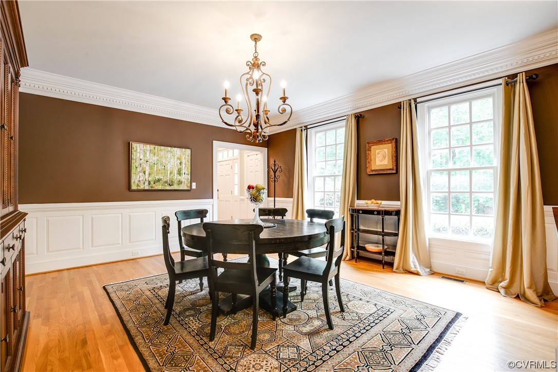 3631 Lansdowne Road Midlothian, VA 23113 - Photo 21 of 50 a view of a dining room with furniture window and wooden floor