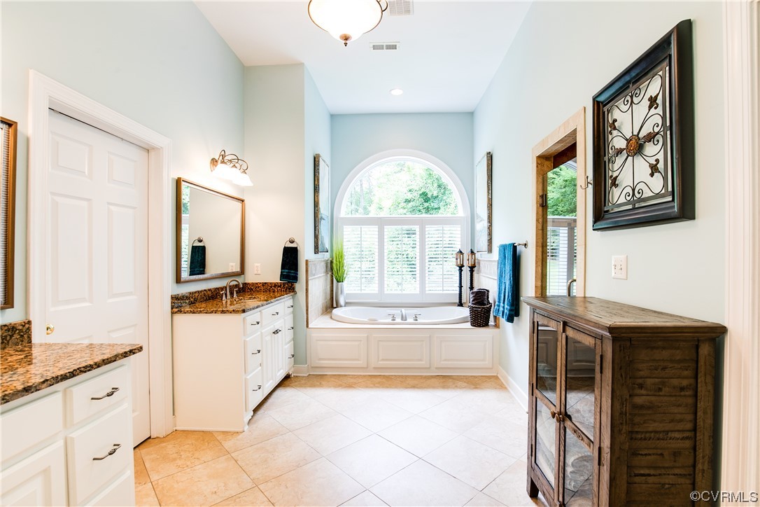 3631 Lansdowne Road Midlothian, VA 23113 - Photo 27 of 50 a large kitchen with granite countertop a large window and a white stove