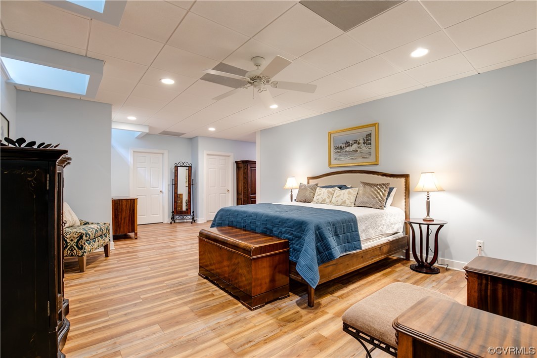 3631 Lansdowne Road Midlothian, VA 23113 - Photo 43 of 50 a spacious bedroom with a bed and wooden floor