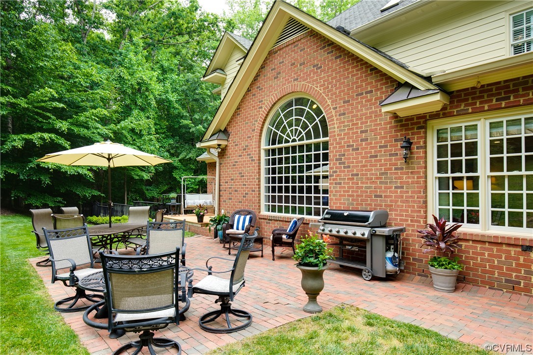 3631 Lansdowne Road Midlothian, VA 23113 - Photo 44 of 50 a view of a dinning table and chairs in the patio