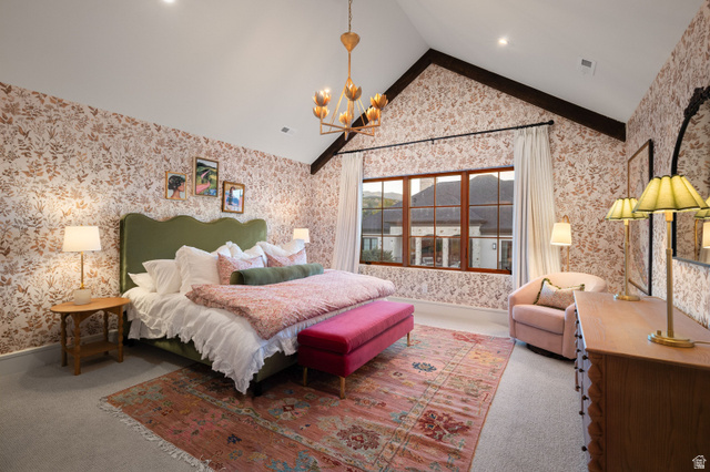 558 West Rheinfalls Circle Midway, UT 84049 - Photo 38 of 61 Vaulted ceiling with exposed wood beams, large multi-pane window, patterned wallpaper, wall-mounted chandelier, and recessed lighting
