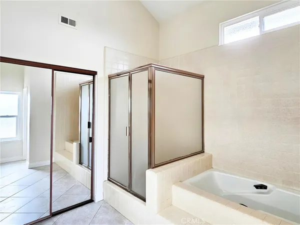 a bathroom with a bathtub sink and toilet
