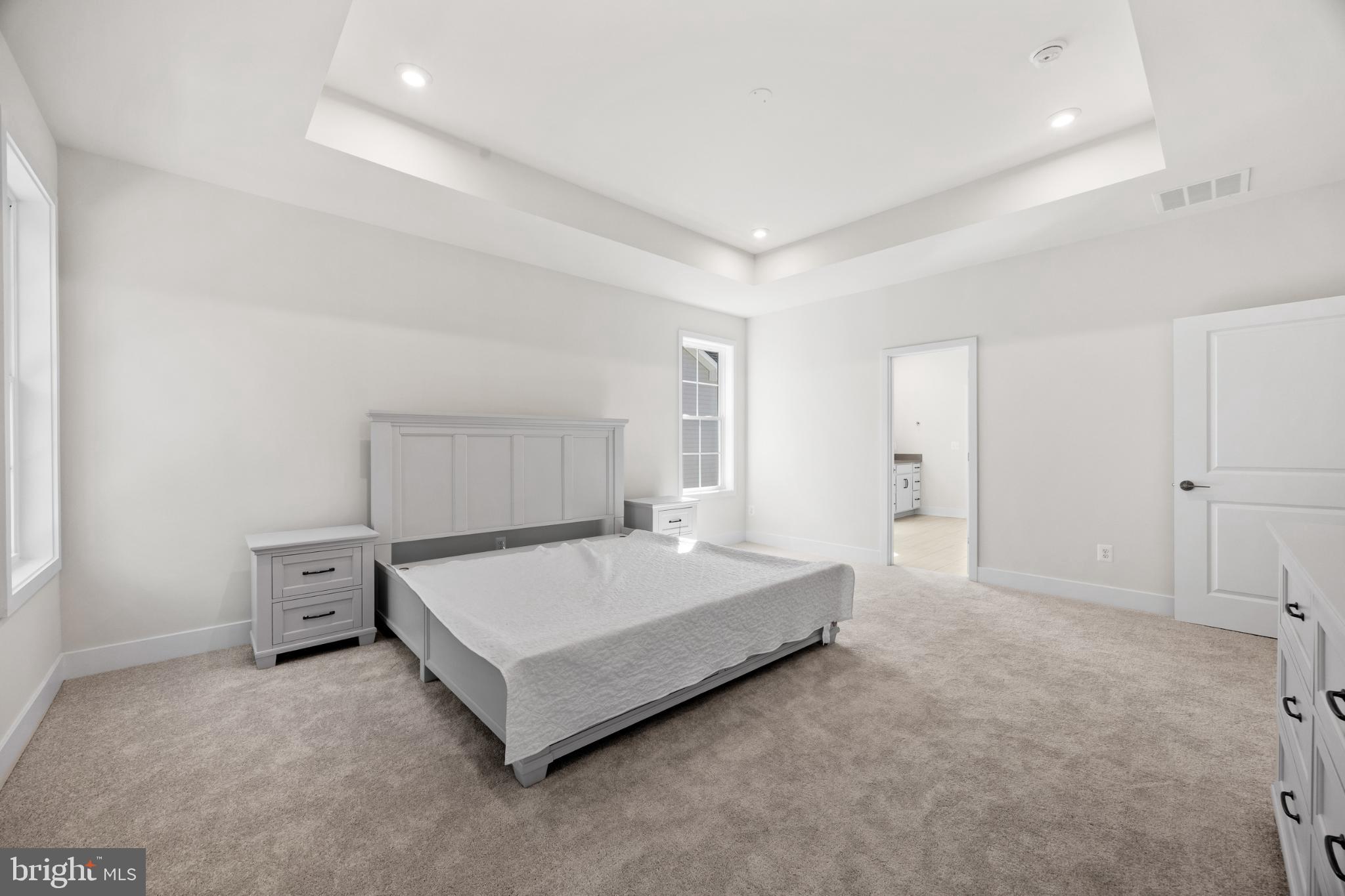 104 Alabaster Lane Stephenson, VA 22656 - Photo 31 of 41 a spacious bedroom with a bed and a window