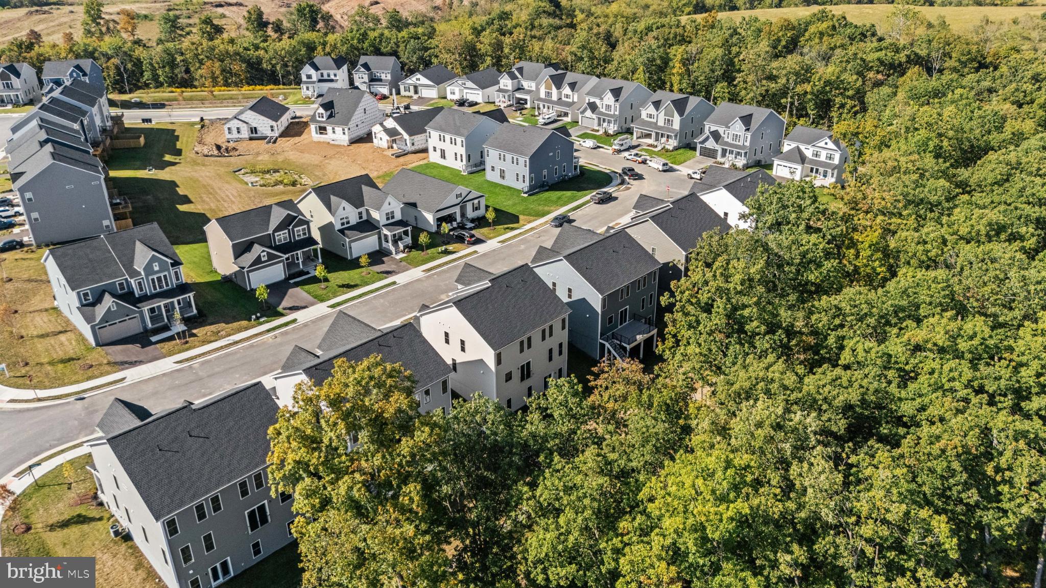 104 Alabaster Lane Stephenson, VA 22656 - Photo 4 of 41 an aerial view of a residential houses with outdoor space