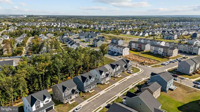 an aerial view of a city with lots of residential buildings