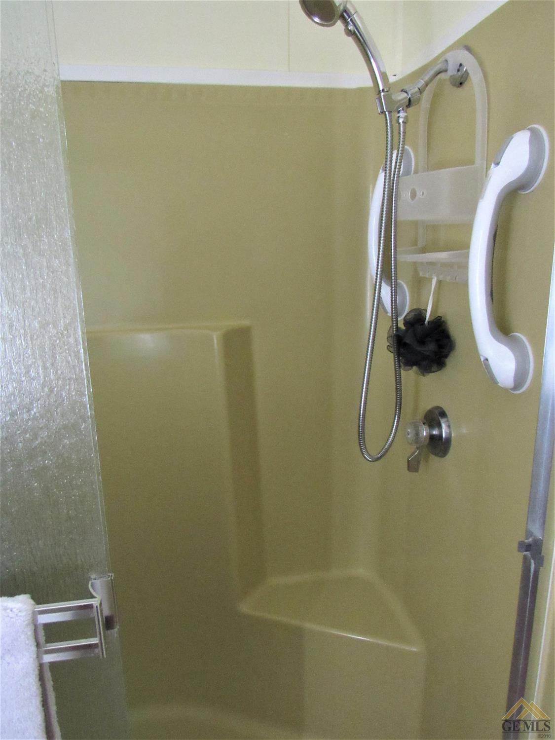 Undisclosed Address Bakersfield, CA 93308 - Photo 15 of 20 a bathroom with a shower