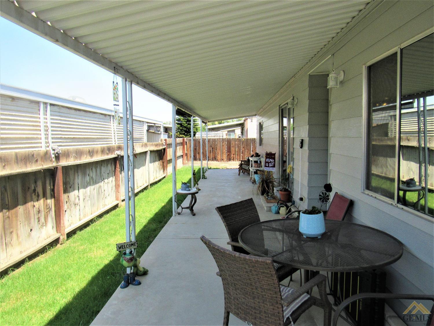 Undisclosed Address Bakersfield, CA 93308 - Photo 19 of 20 a dining room with furniture and a floor to ceiling window
