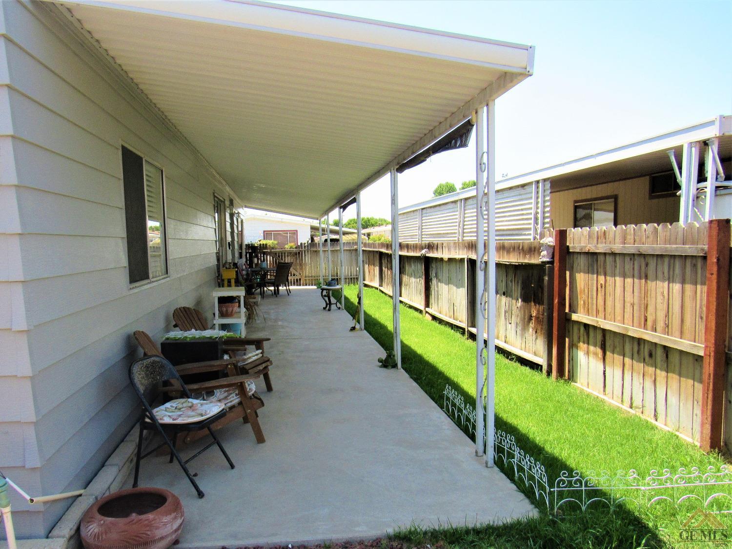Undisclosed Address Bakersfield, CA 93308 - Photo 20 of 20 a view of a porch with furniture
