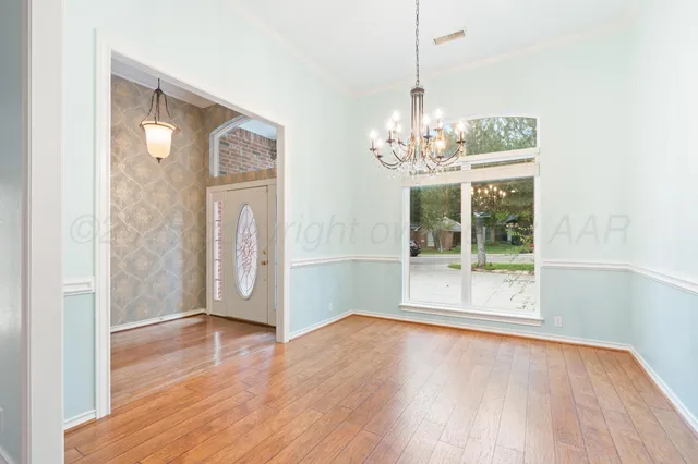 a view of livingroom with hardwood floor and window