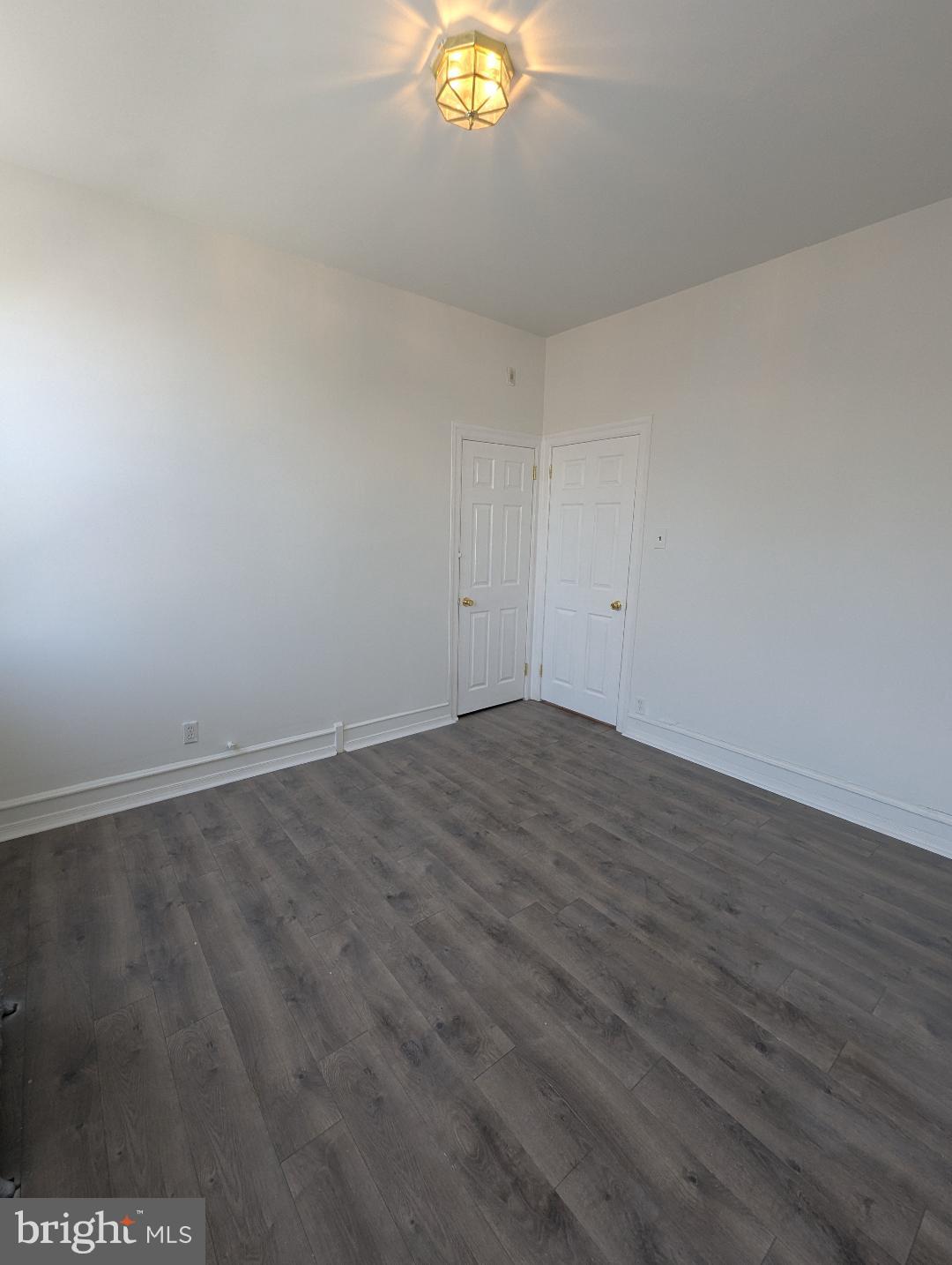7158 Torresdale Avenue Philadelphia, PA 19135 - Photo 13 of 17 a view of an empty room and a window