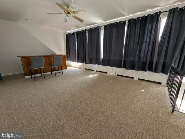 a kitchen with stainless steel appliances a refrigerator and a stove