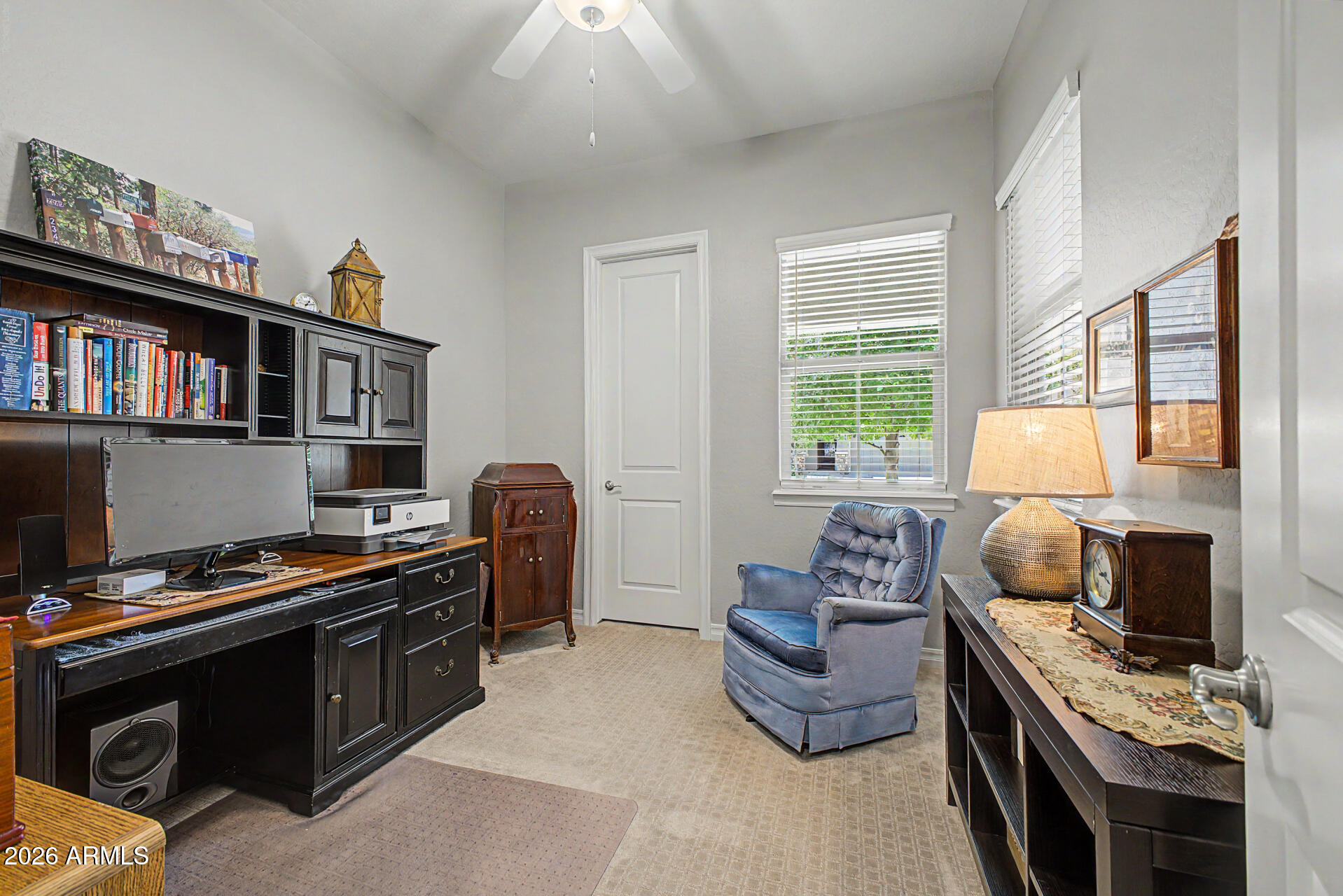 3560 East Appaloosa Road Gilbert, AZ 85296 - Photo 21 of 32 a bedroom with furniture and a window