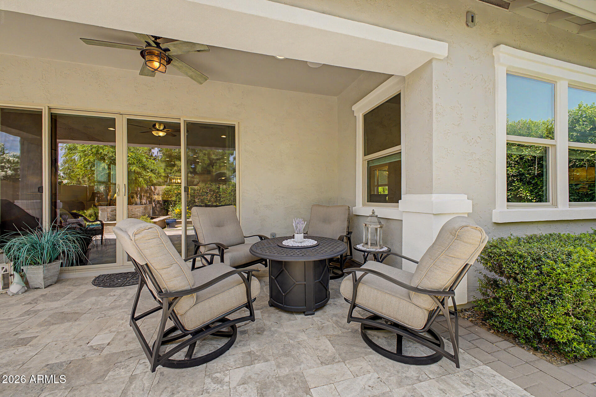 3560 East Appaloosa Road Gilbert, AZ 85296 - Photo 26 of 32 a building outdoor space with patio furniture and potted plants