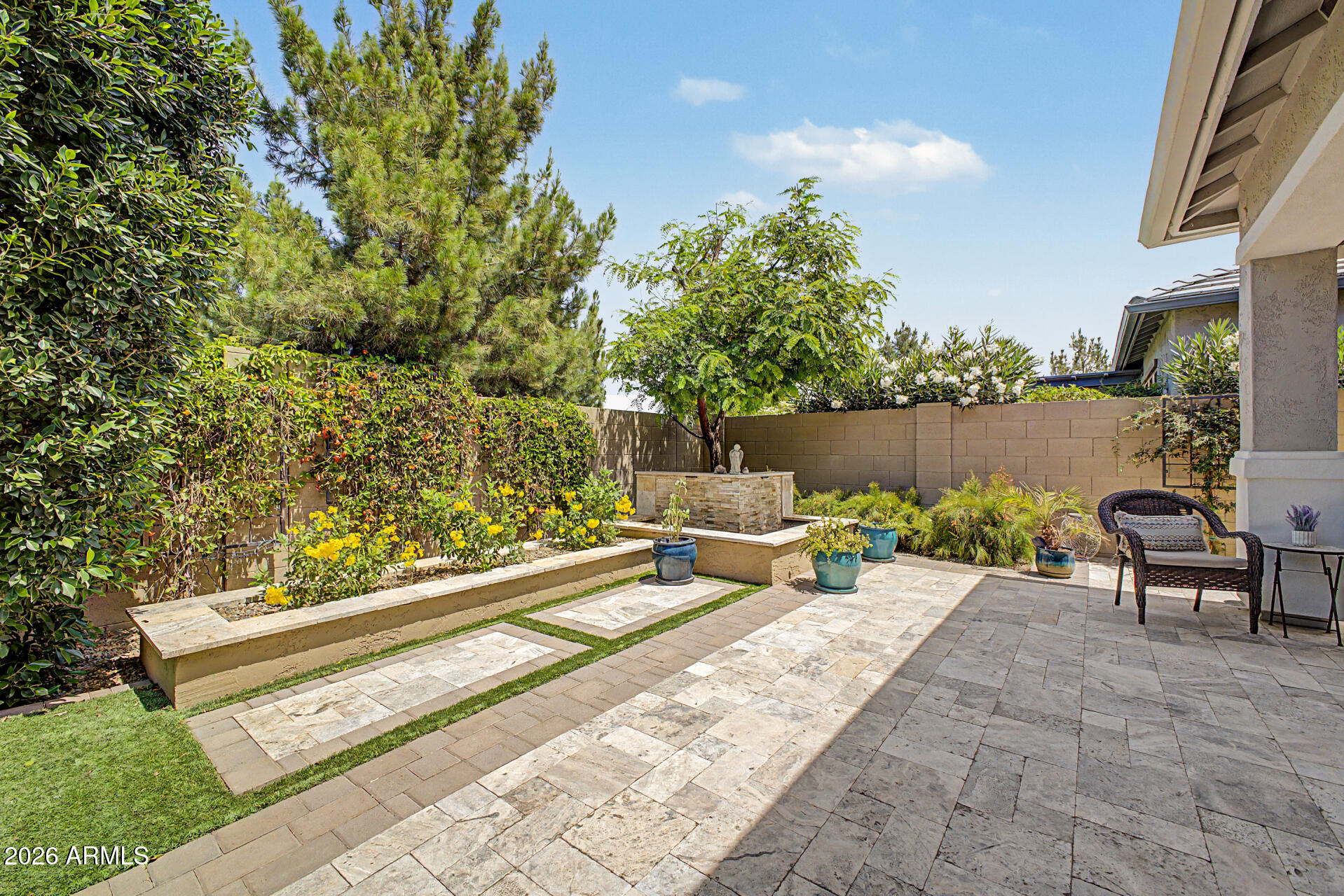 3560 East Appaloosa Road Gilbert, AZ 85296 - Photo 27 of 32 a view of a bench in a patio