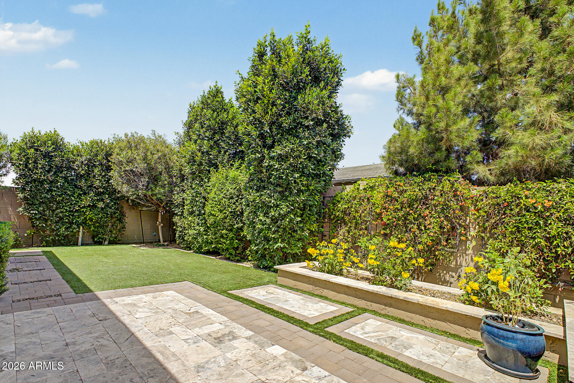 3560 East Appaloosa Road Gilbert, AZ 85296 - Photo 29 of 32 a view of a garden with an outdoor space