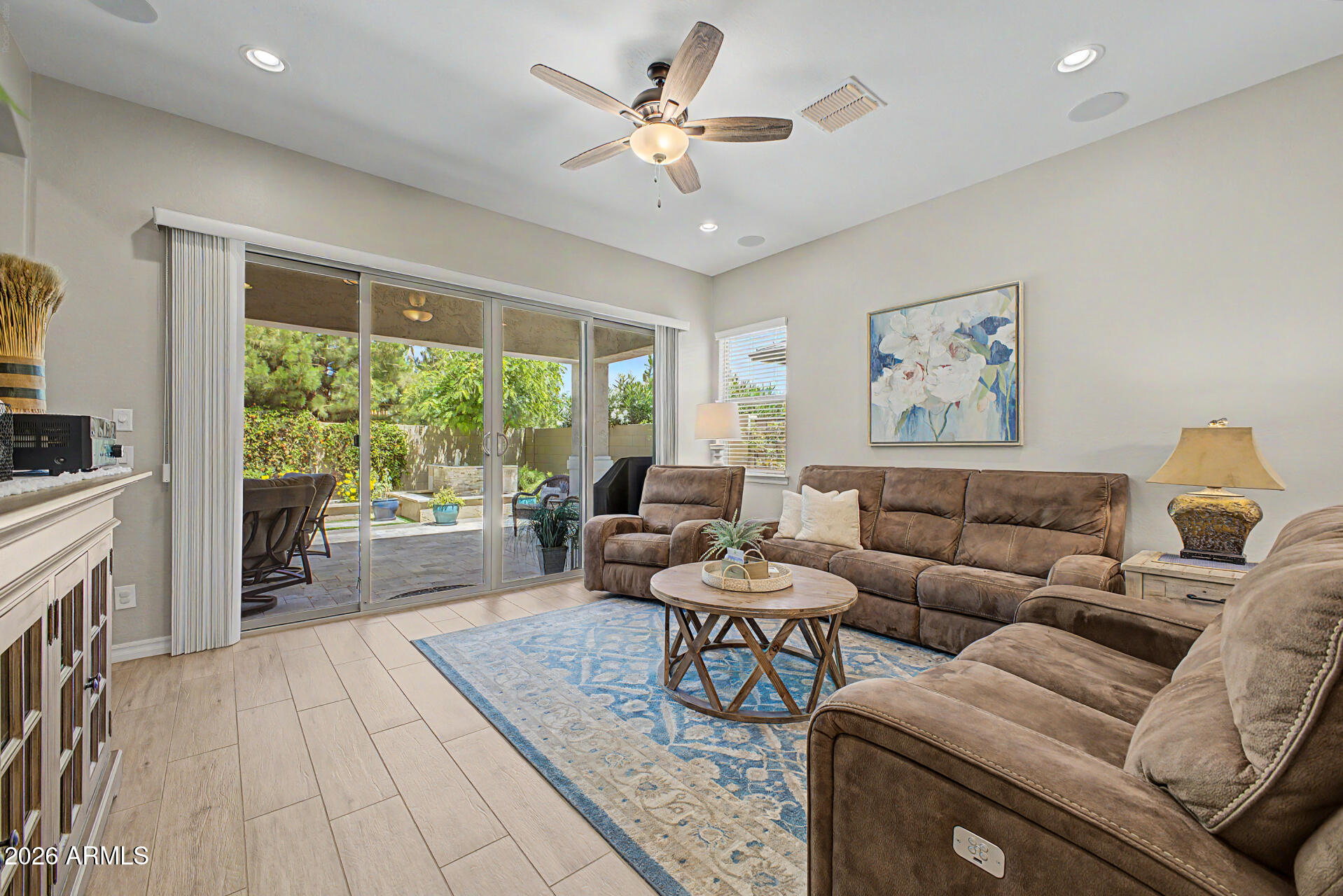 3560 East Appaloosa Road Gilbert, AZ 85296 - Photo 6 of 32 a living room with furniture and a large window