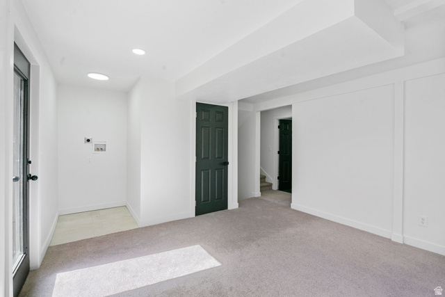 432 Calnette Drive Sandy, UT 84070 - Photo 23 of 48 Spacious room featuring light gray carpeting, recessed lighting, and a neutral color palette
