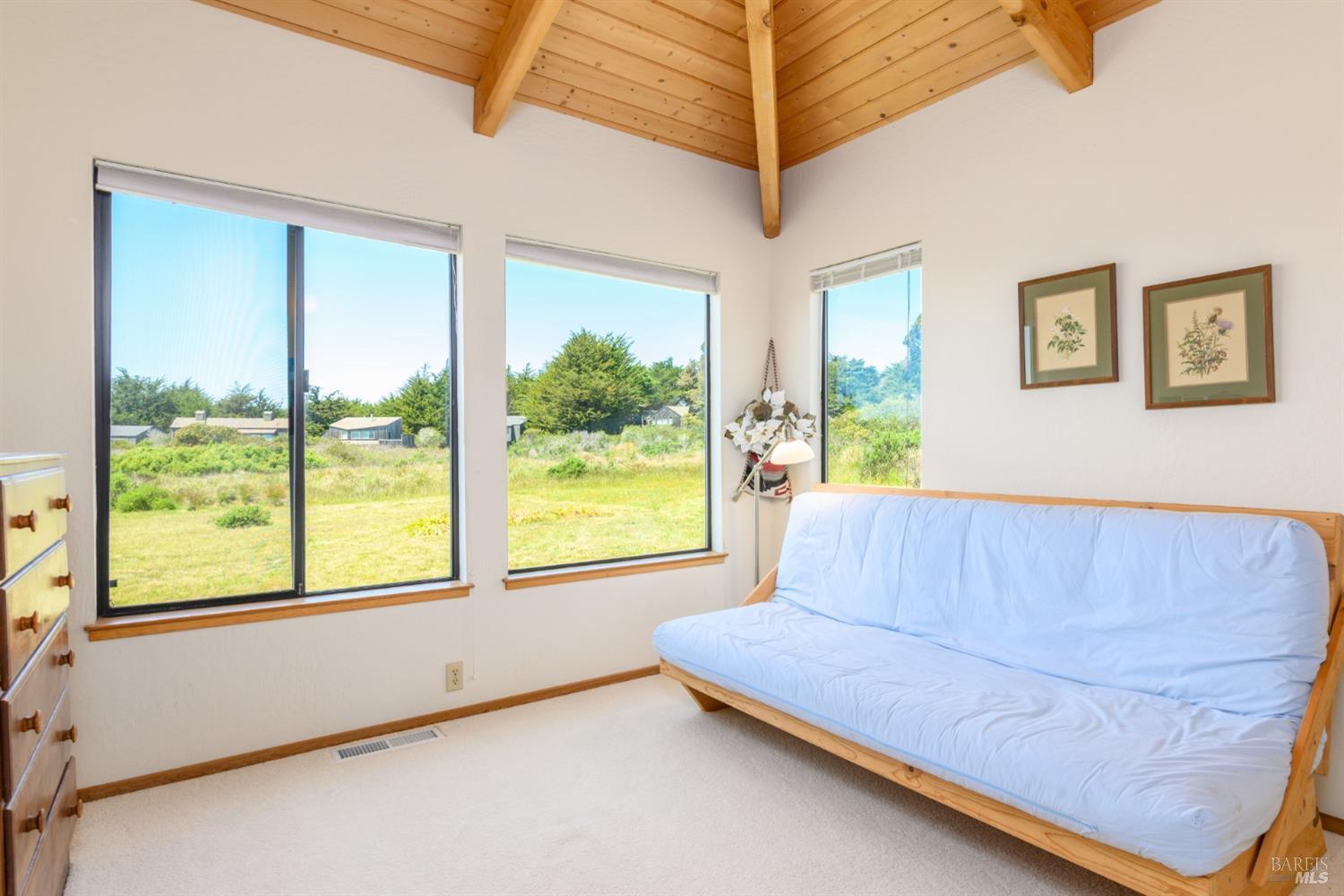 267 Sea Stack The Sea Ranch, CA 95497 - Photo 29 of 35 a living room with furniture and a window
