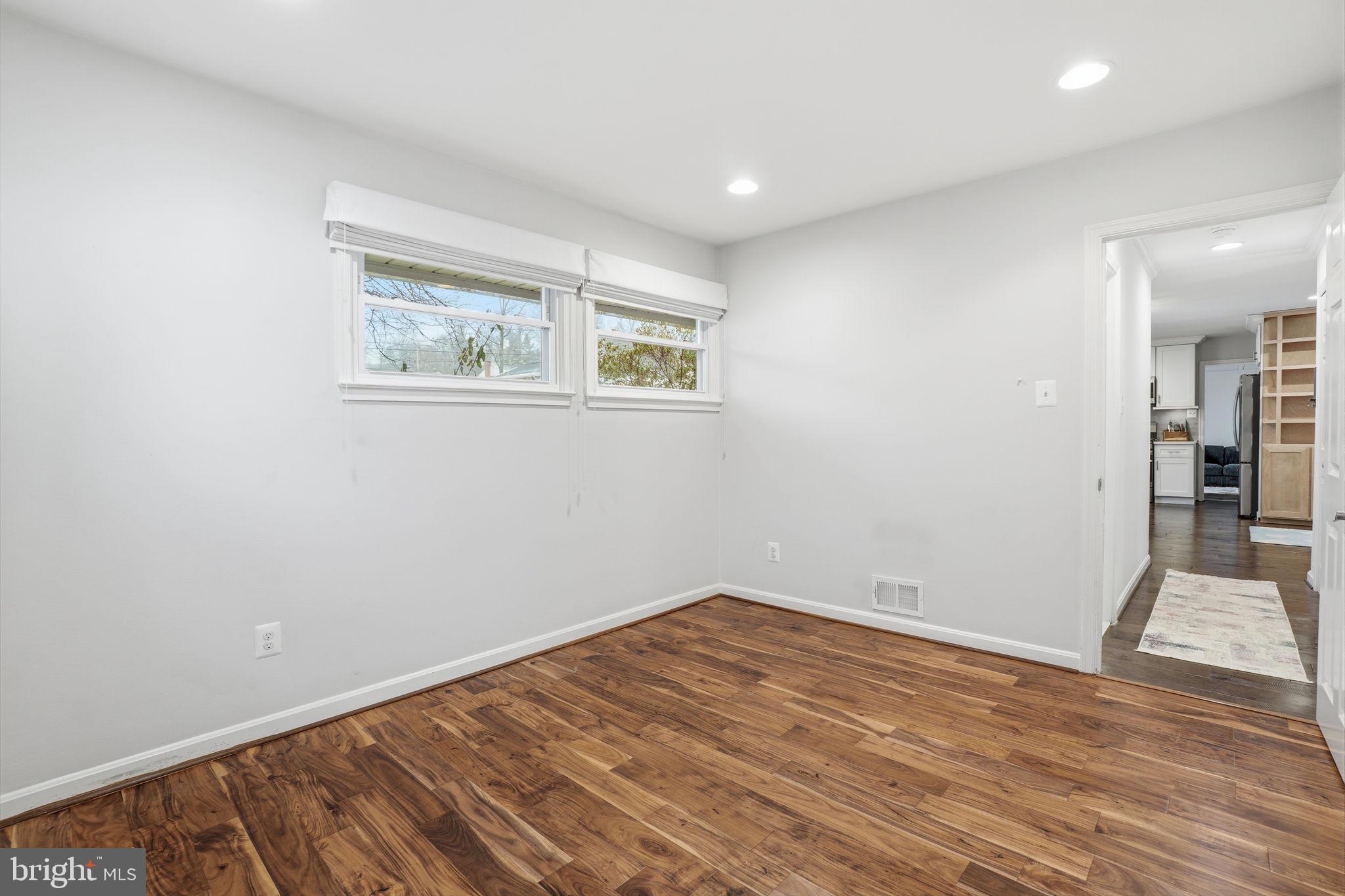 7921 Foote Lane Springfield, VA 22151 - Photo 16 of 26 a view of room with wooden floor and window