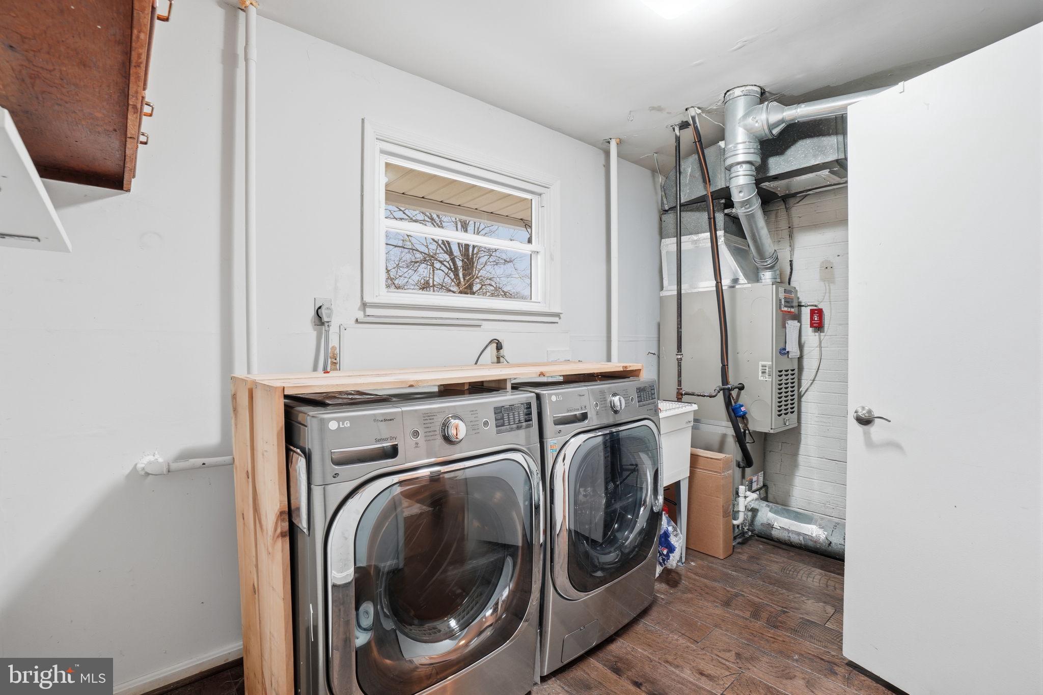 7921 Foote Lane Springfield, VA 22151 - Photo 21 of 26 a utility room with dryer and washer