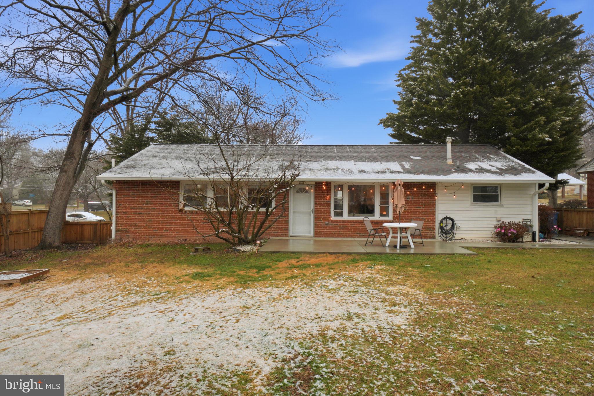 7921 Foote Lane Springfield, VA 22151 - Photo 25 of 26 a view of a house with a big yard and a large tree