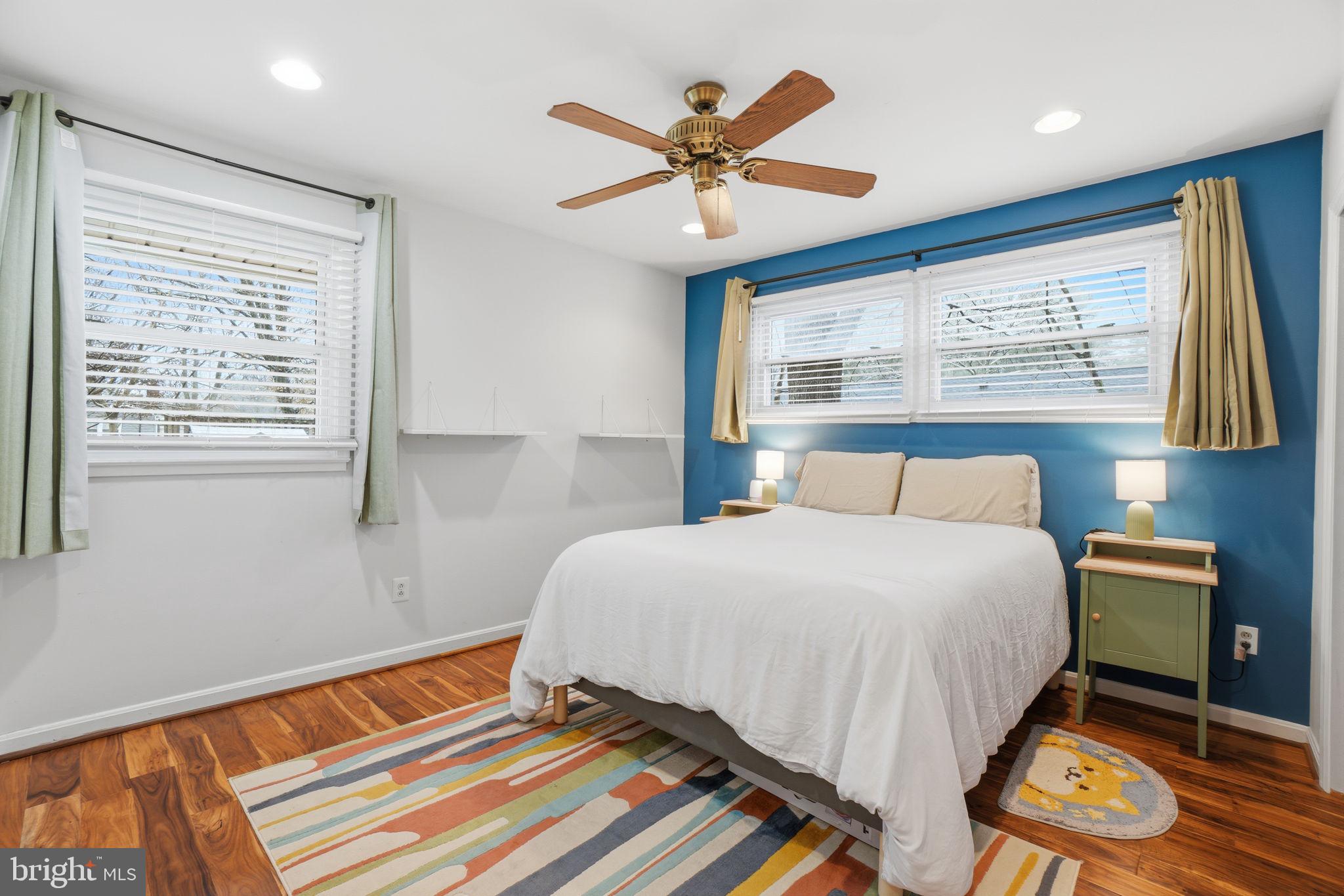 7921 Foote Lane Springfield, VA 22151 - Photo 9 of 26 a bedroom with a bed and a window