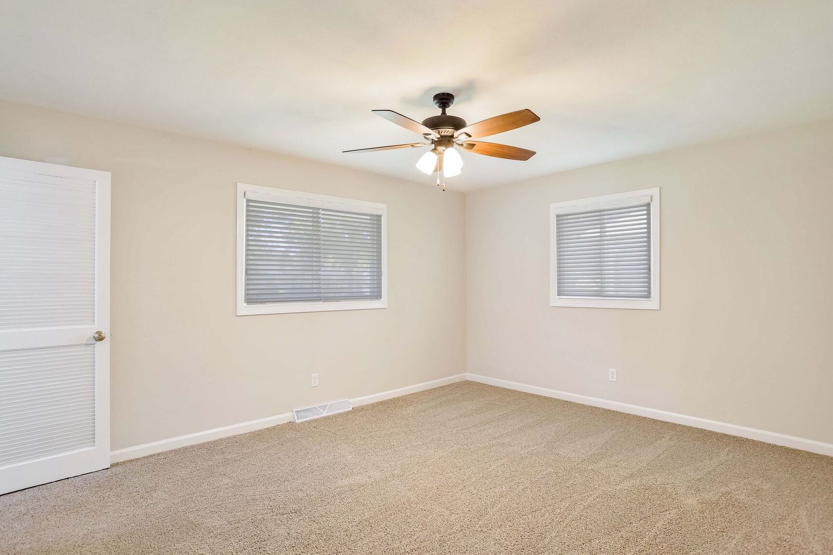 1716 Georgetown Drive Champaign, IL 61821 - Photo 18 of 36 a view of a big room with carpet