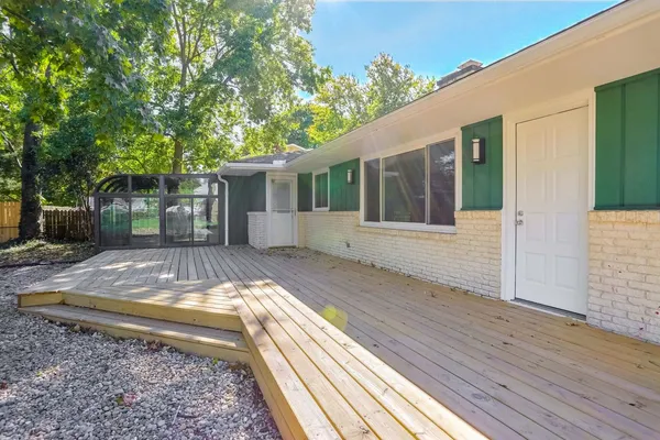 a view of a backyard with a garden