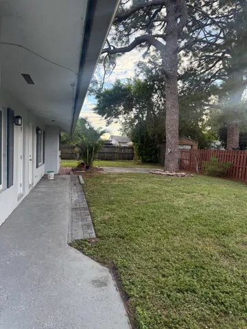 a view of a backyard with a garden