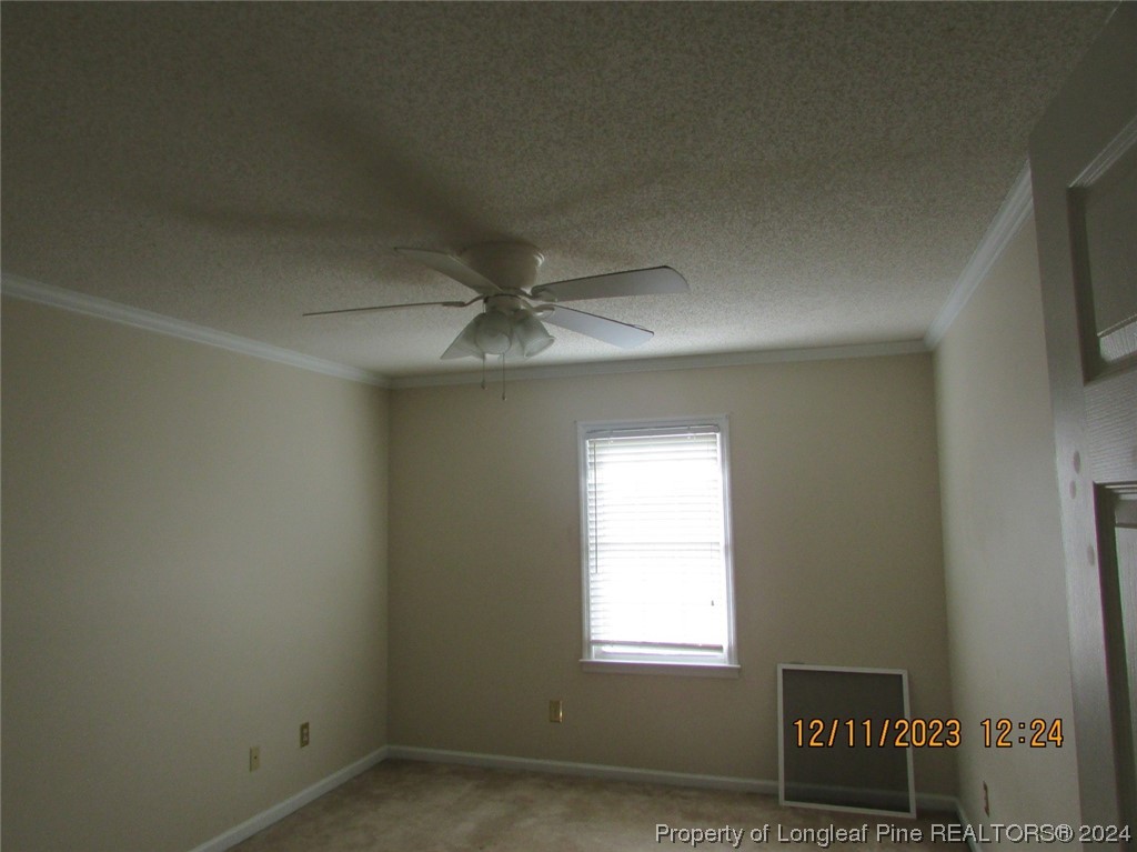 8850 Timothy Road Dunn, NC 28334 - Photo 11 of 15 an empty room with a window